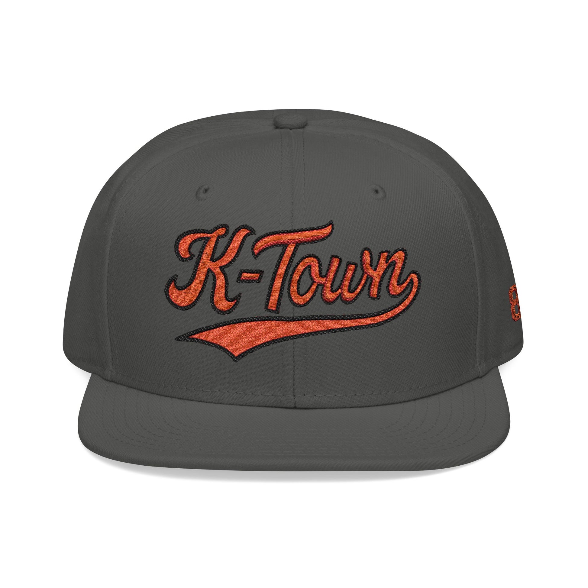 Gray cap with orange 'K-Town' embroidery on a white background