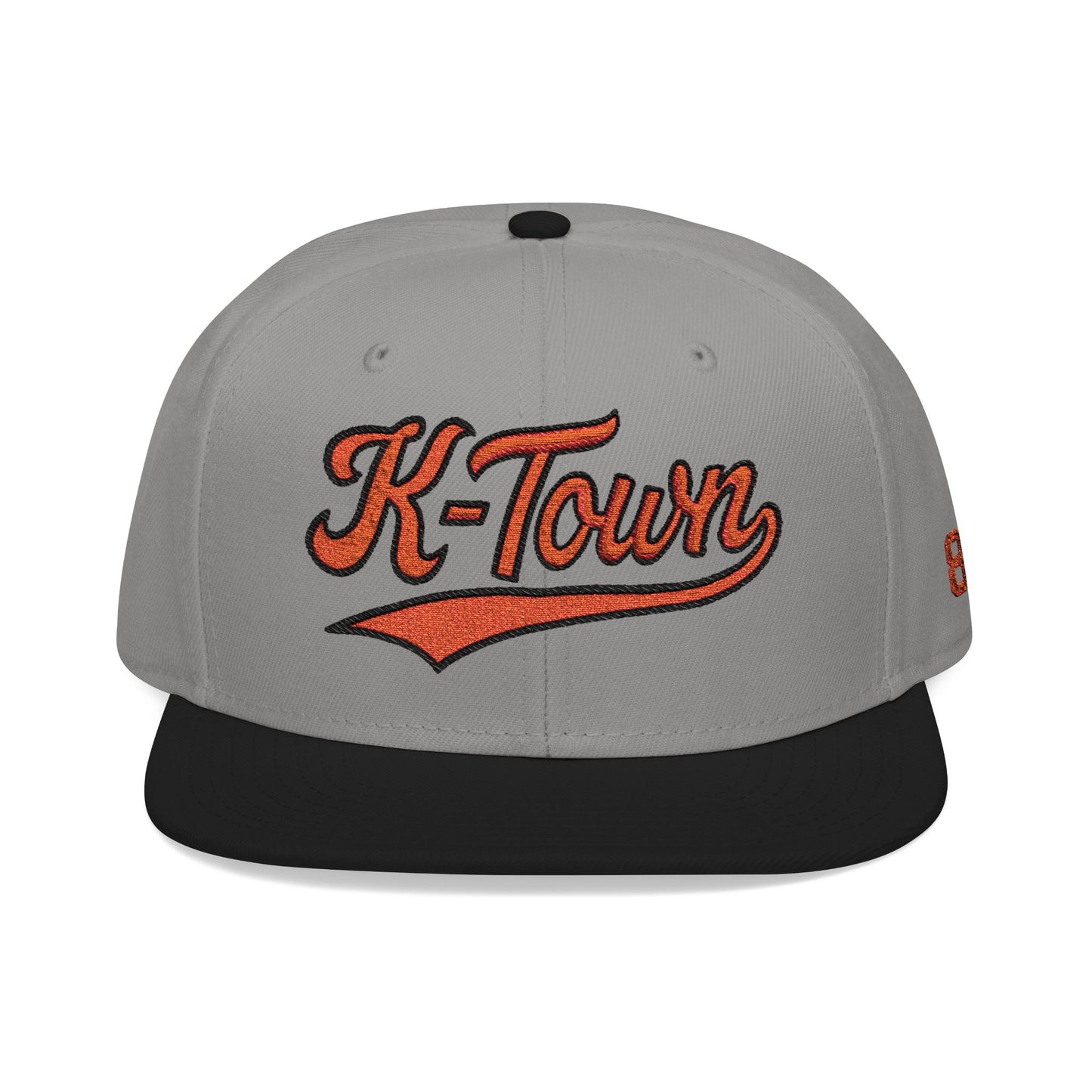 Gray cap with 'K-Town' in orange on a white background