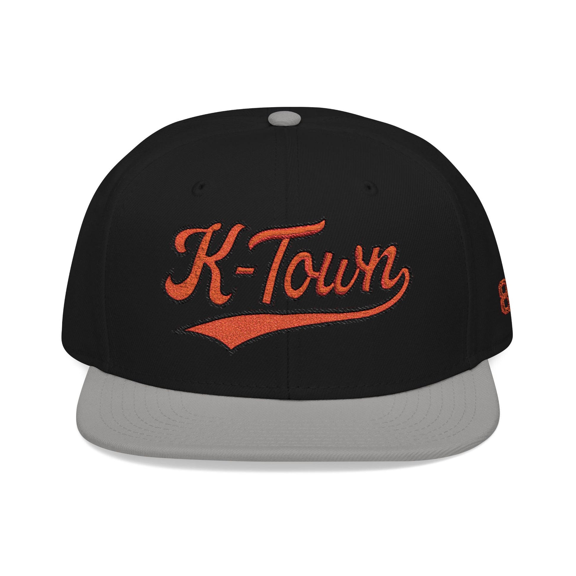 Black cap with Orange 'K-Town' text on a white background