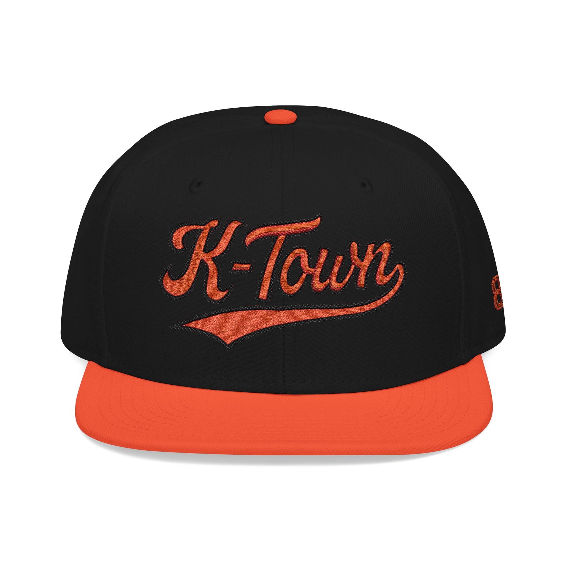 Black and orange cap with 'K-Town' text on a white background